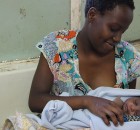 Mphatso Gumulira, 15, with her son Zayitwa in the Queen Elizabeth hospital in Blantyre, Malawi. By DFID - UK Department for International Development, russavia - Wikimedia Commons.