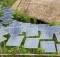 15 Dec 2013, Ubud, Gianyar Regency, Bali, Indonesia --- Solar panels in tropical garden --- Image by © Marc Romanelli/Blend Images/Corbis