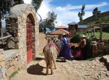 Women with mules on Isla del Sol, Bolivia.